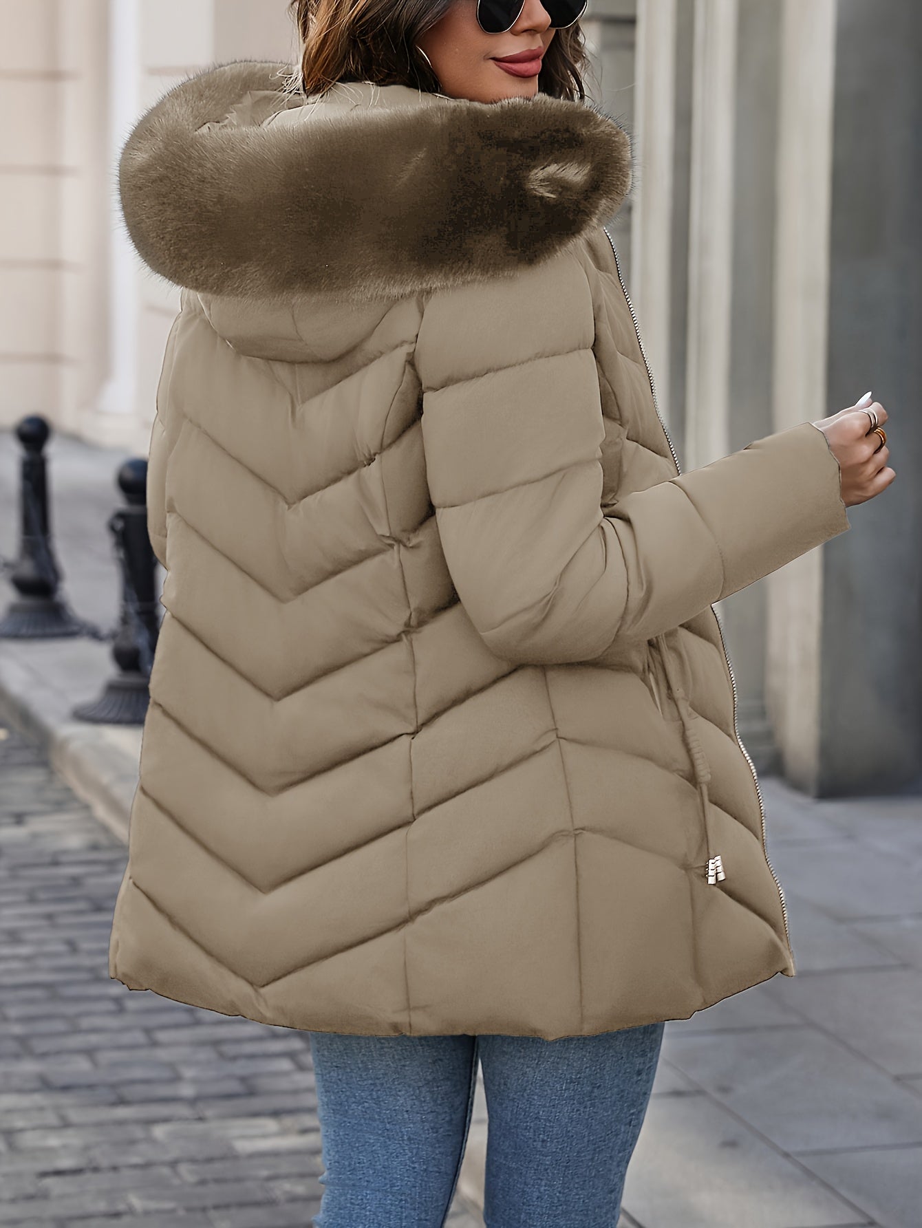 Black Lumina Wear Florence quilted puffer coat with faux-fur hood, stylish winter outerwear for cold weather.
