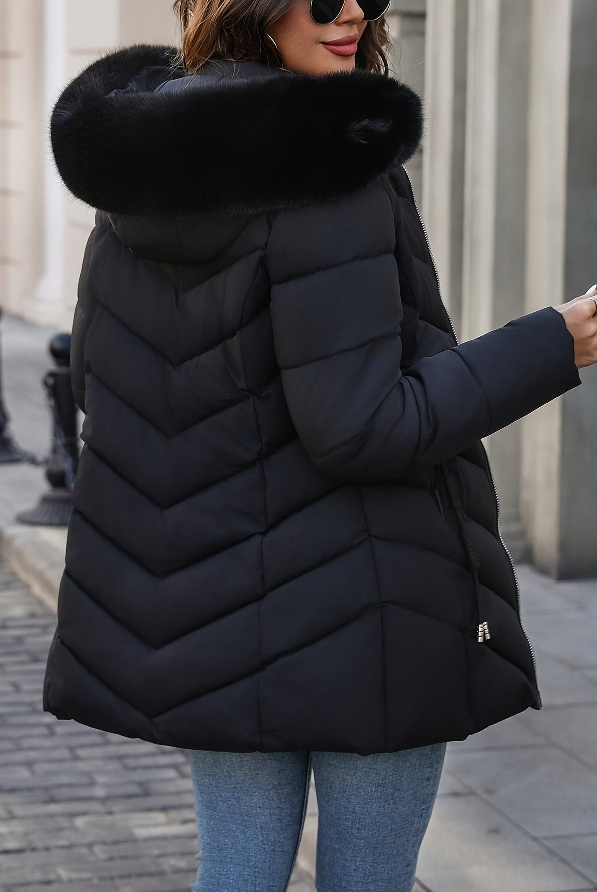 Black Florence Lumina Wear quilted puffer coat with faux-fur hood, stylish and warm winter outerwear for women.