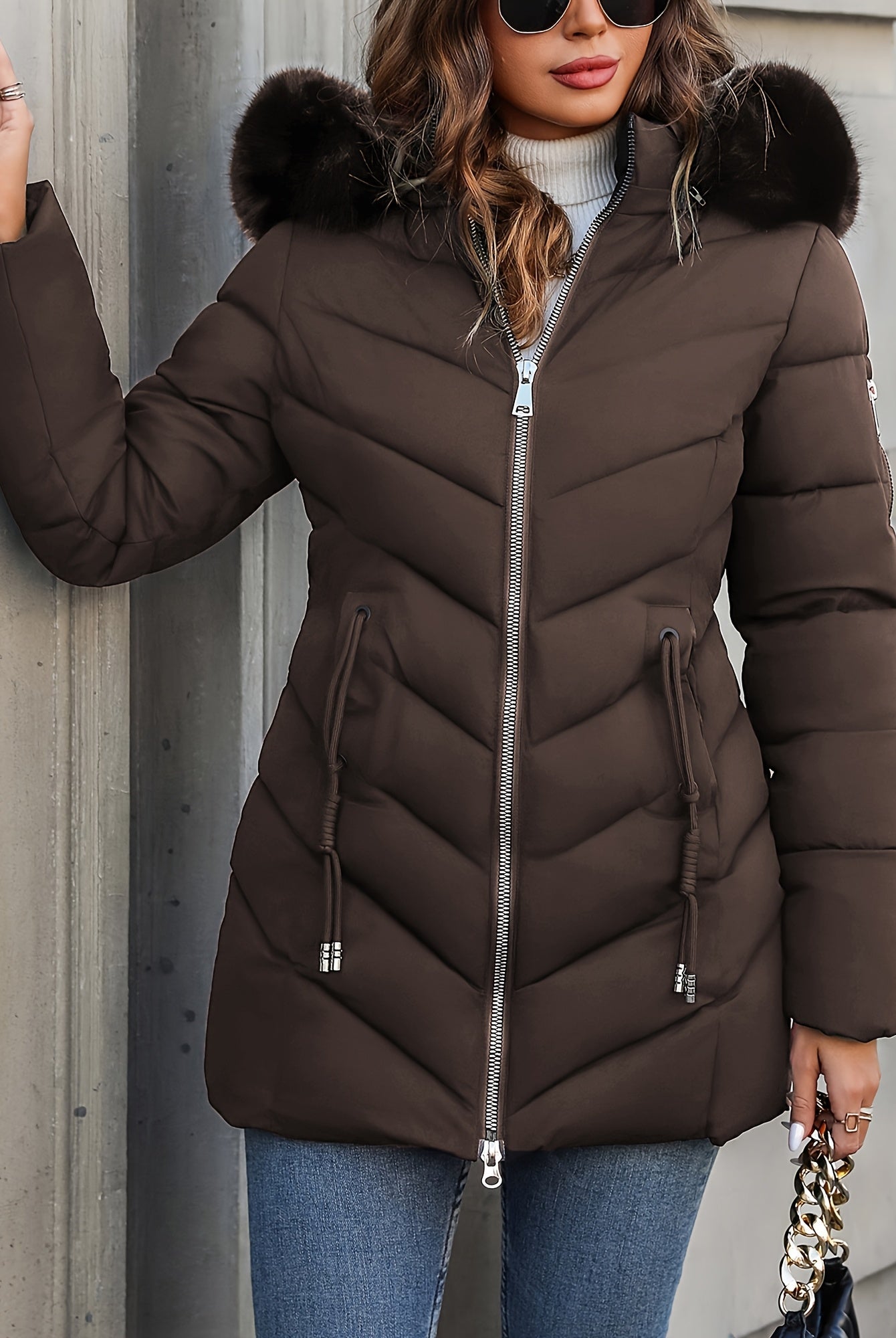 Black Lumina Wear Florence quilted puffer coat with faux-fur hood, stylish winter outerwear with a padded design.