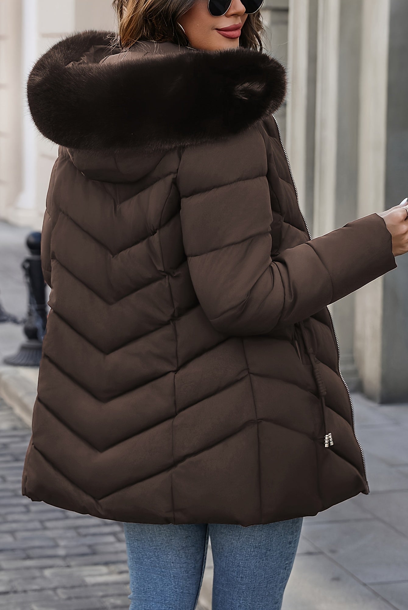 Black Lumina Wear Florence quilted puffer coat with faux-fur hood, stylish winter outerwear for cold weather.