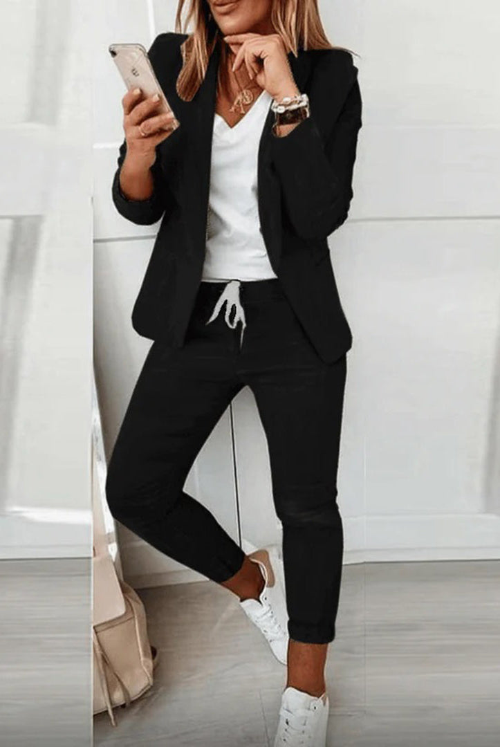 Lavender women's tailored blazer and relaxed jogger pants set by Lumina Wear, stylish and comfortable for casual or office wear.