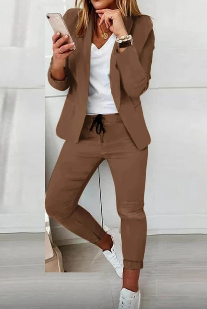 Lavender women's tailored blazer and relaxed jogger pants set by Lumina Wear, stylish and comfortable for everyday wear.