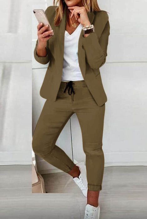 Lavender women's tailored blazer and relaxed jogger pants set by Lumina Wear, stylish and comfortable for casual or professional wear.