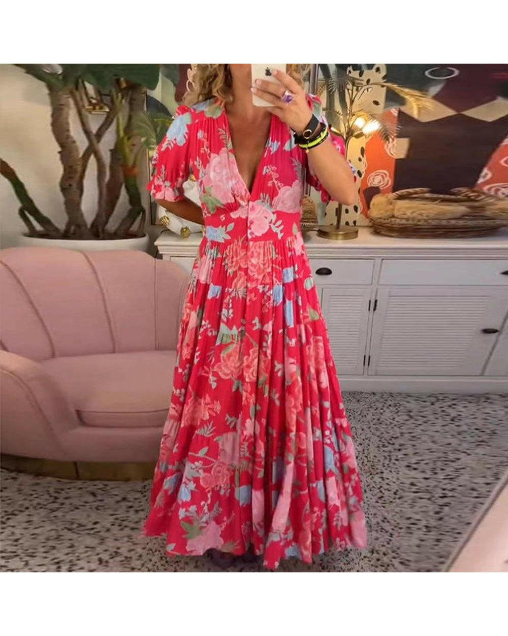 Lumina Wear Floriana vibrant floral dress in red, flowing fabric, perfect for spring and summer occasions.
