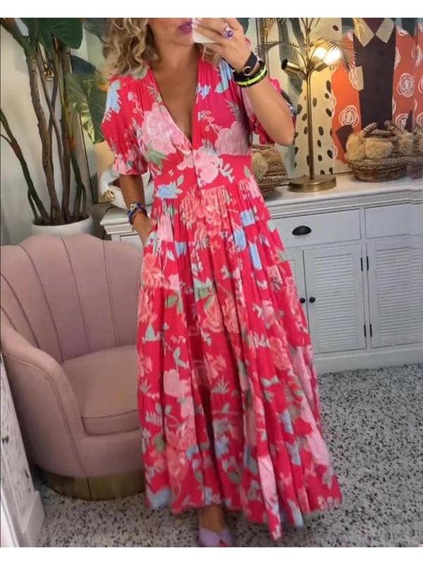 Lumina Vancouver FLORIANA™ vibrant floral dress in red, featuring a flowy design perfect for warm weather.