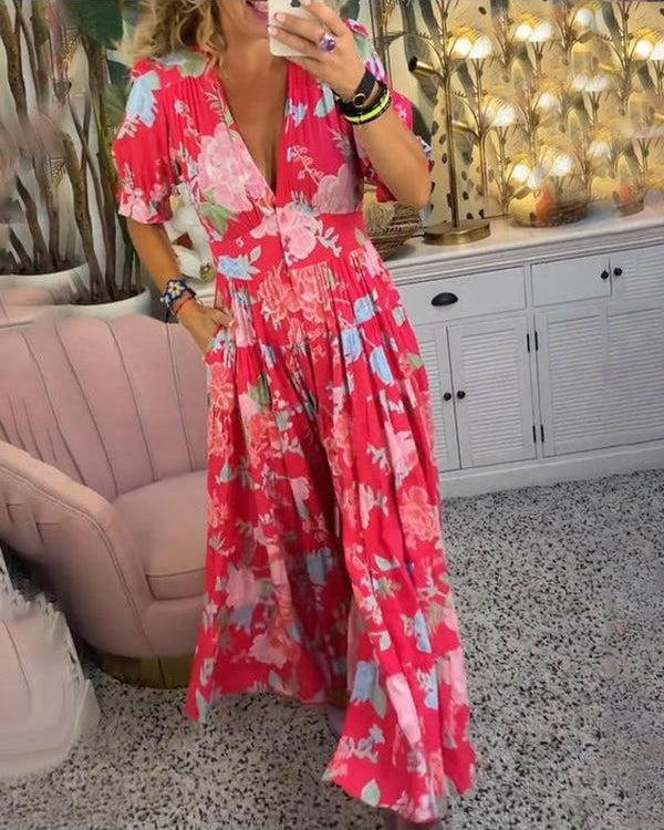 Red Floriana Vibrant Floral Dress by Lumina Wear, featuring bold floral patterns and a flowing silhouette.