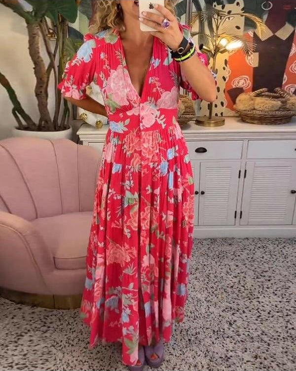 Lumina Wear Floriana vibrant floral dress in red, showcasing a stylish, colorful design perfect for spring and summer occasions.