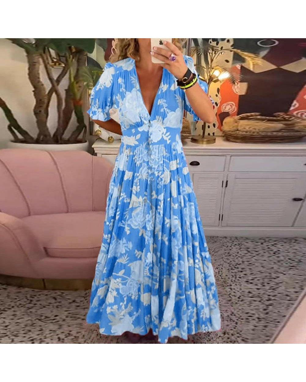 Red Floriana floral dress by Lumina Wear featuring vibrant flower patterns and a stylish fit, perfect for spring and summer wear.