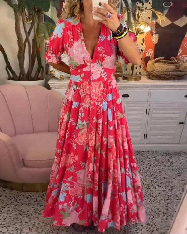 Lumina Wear Floriana vibrant floral dress in red, featuring a lightweight, flowy design perfect for warm weather.