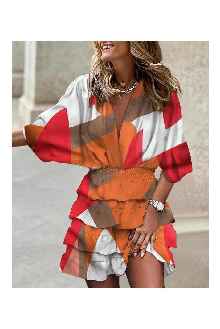 Colorful Francesca™ stylish print dress by Lumina Vancouver, featuring a vibrant pattern and flowing silhouette.