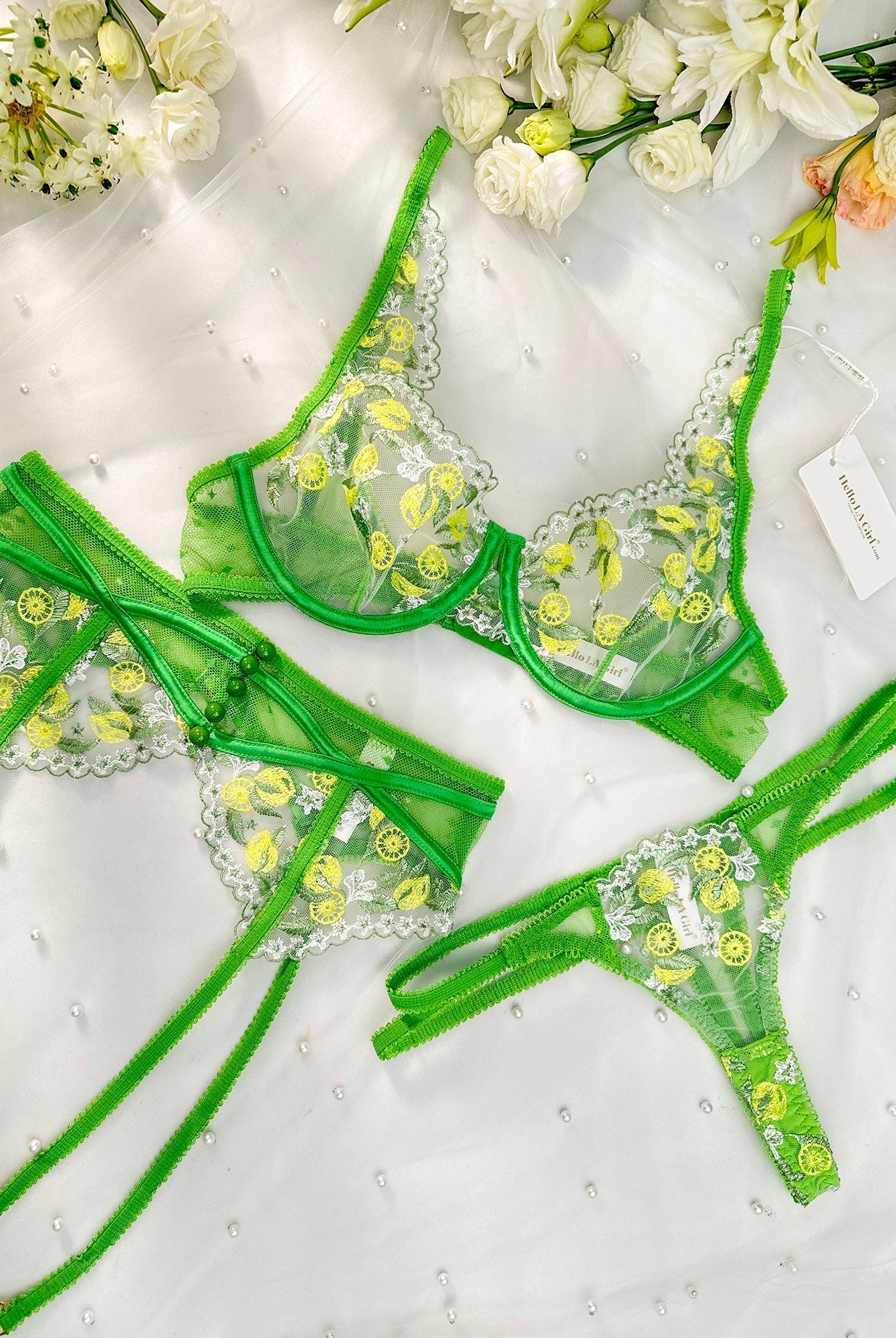 Fresh lemon embroidery lingerie set from Lumina Wear, green color, includes bra, panties, and garter belt.