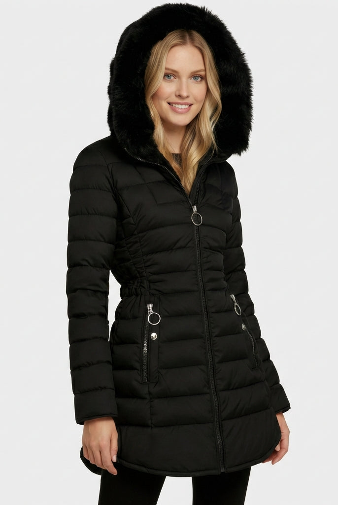 Black Freya puffer coat by Lumina Wear featuring fleece lining and an oversized hood, designed for warmth and comfort.
