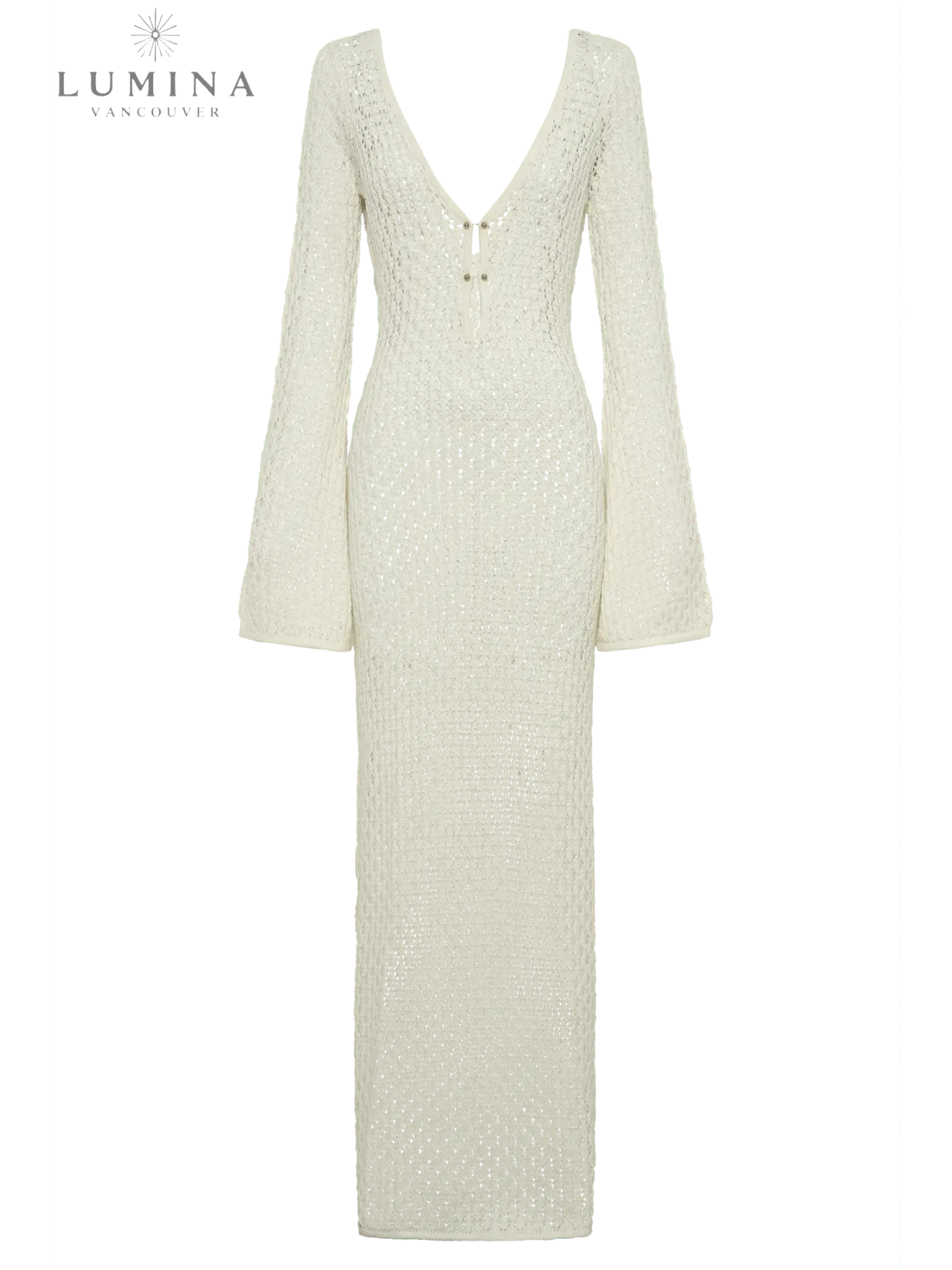Elegant white Giana dress by Lumina Vancouver, perfect for holiday vibes, showcased on a model in a stylish setting.
