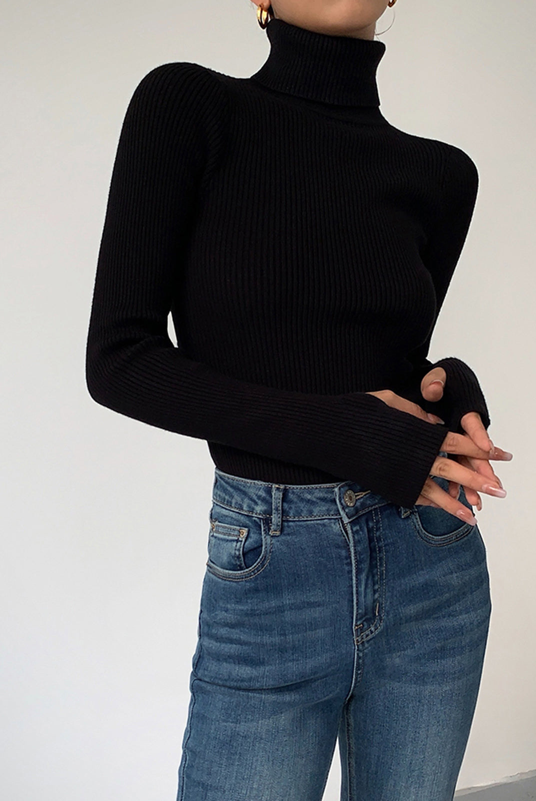 Dark brown Lumina Wear Hailey minimalist turtleneck top, showcasing a sleek winter-ready design with a close-up of the fabric and fit.