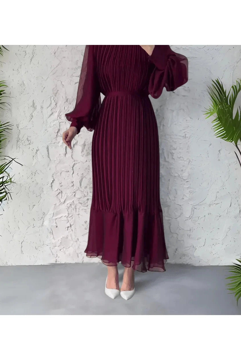 Blue Hannah pleated elegant dress by Lumina Wear, stylish and flowing with a sophisticated design for special occasions.