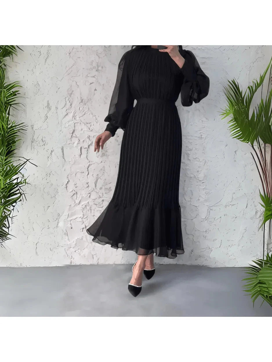 Blue Hannah™ pleated elegant dress by Lumina Vancouver, showcasing a flowing, stylish design perfect for formal occasions.