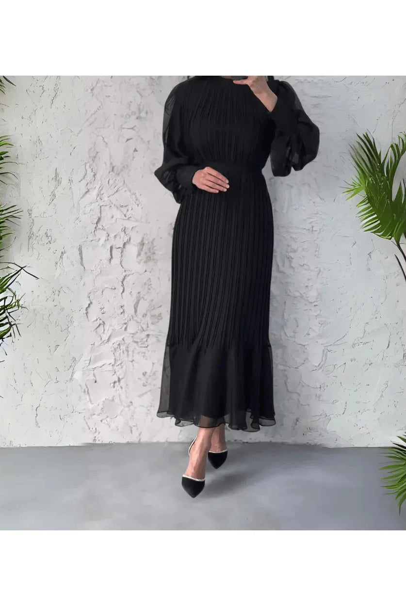Blue Hannah pleated elegant dress by Lumina Wear, featuring flowy fabric and stylish design, perfect for formal occasions.