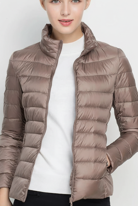 Harriet Lumina Wear lightweight black puffer jacket with stand collar, shown in matcha color, XS size, stylish winter outerwear.