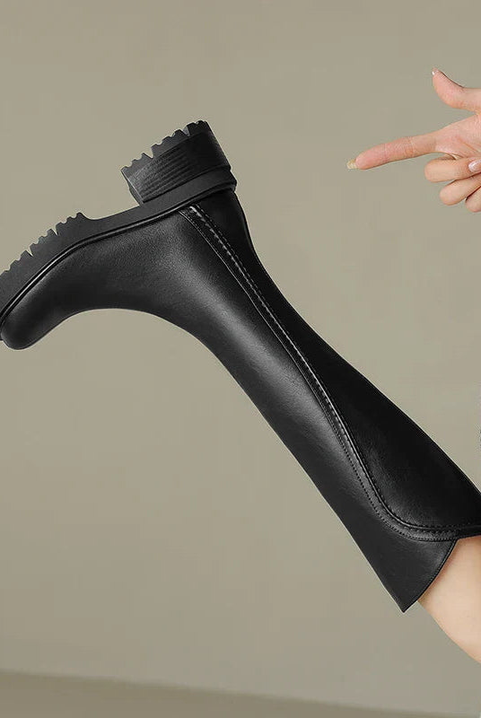 Elegant black knee-high boots for women by Lumina Wear featuring orthopedic support and brown fur detail.