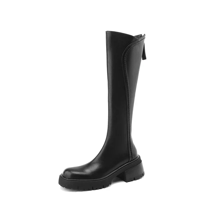 Elegant black knee-high boots for women by Lumina Wear with orthopedic support and brown fur accents.