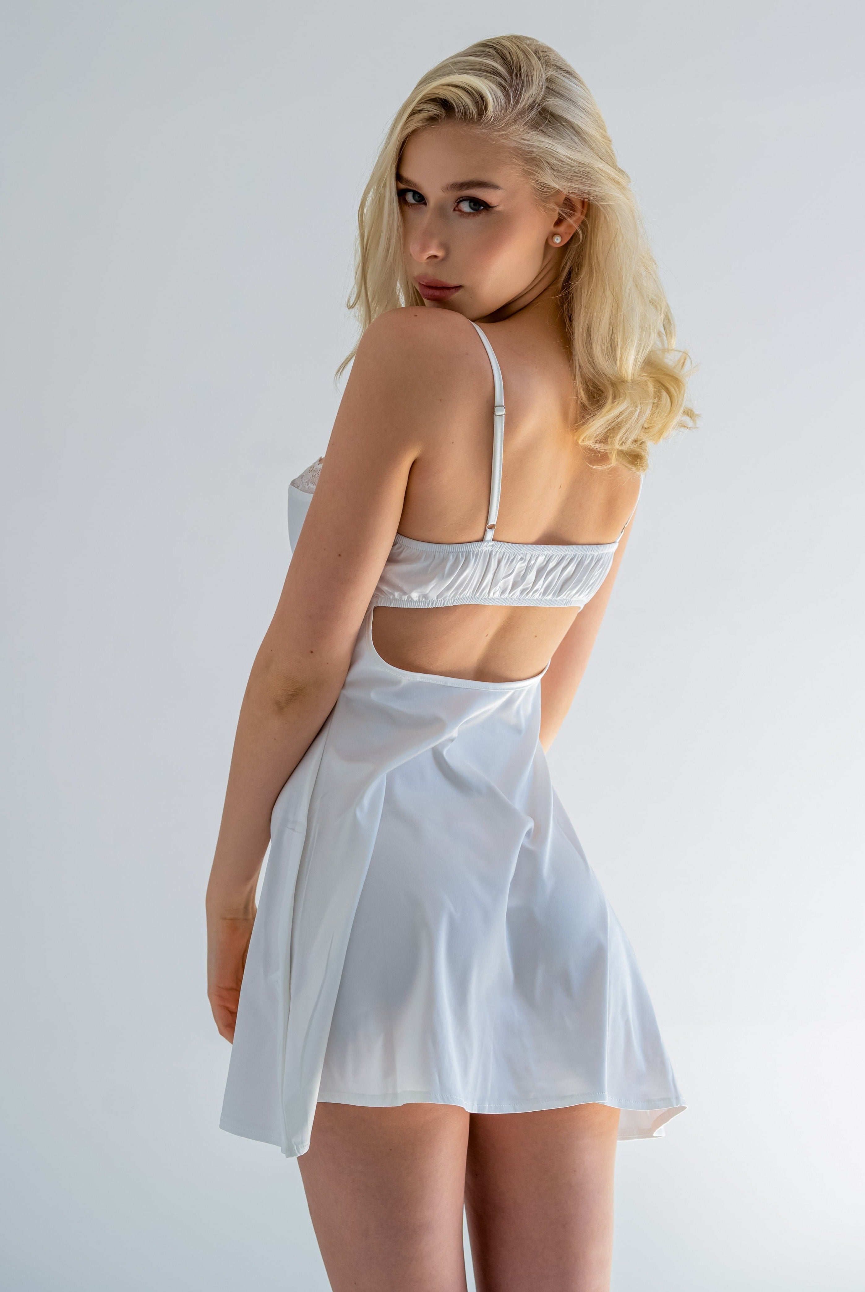 White silk satin nightdress named Heidi from Lumina Wear, showcasing smooth fabric and elegant sleepwear design.