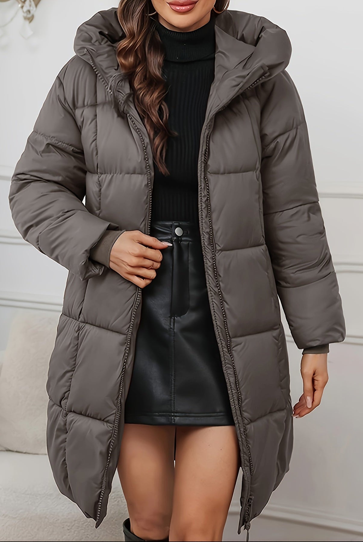 Holly cozy longline hooded puffer coat by Lumina Wear in reddish-brown, featuring a minimalist design and insulated warmth.