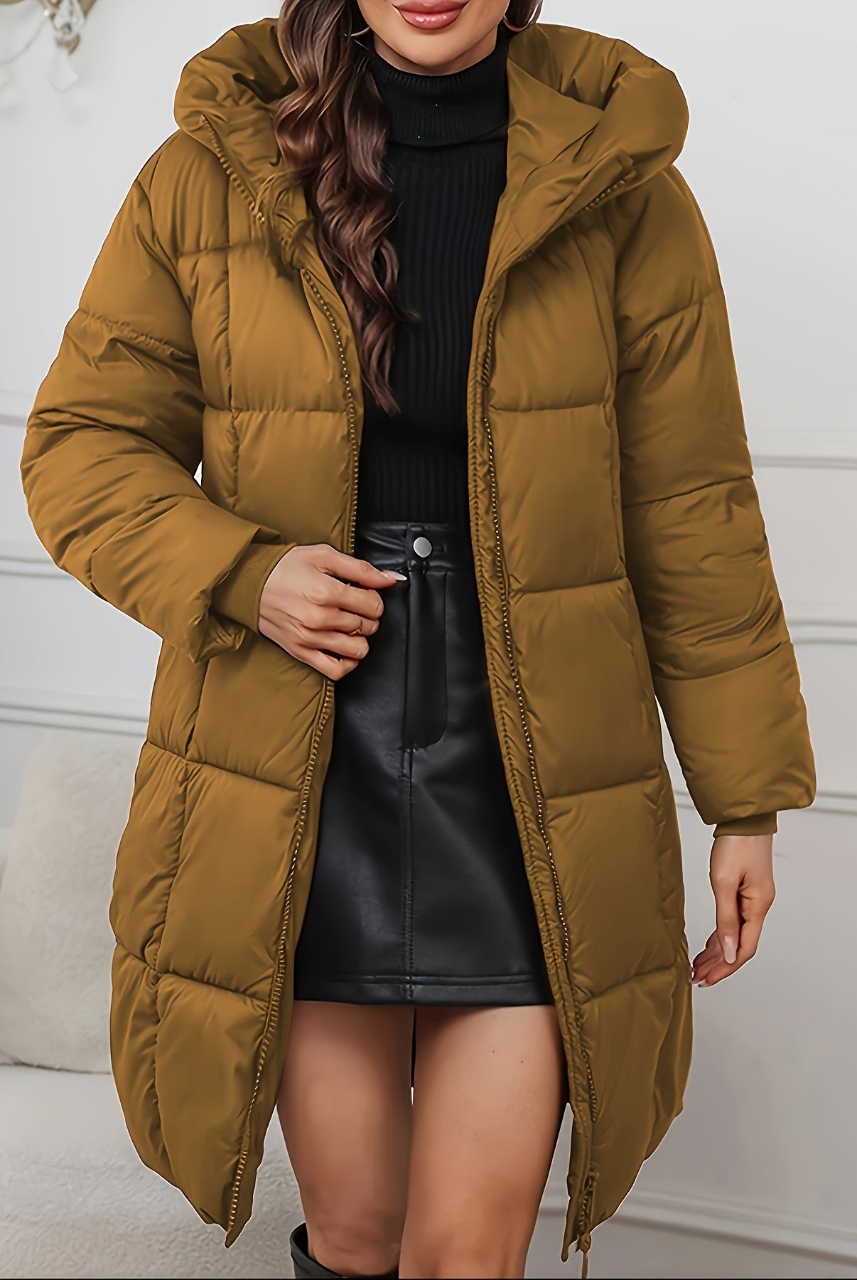 Redish-brown Holly longline hooded puffer coat by Lumina Wear featuring a minimalist design and cozy, insulated puffer style.
