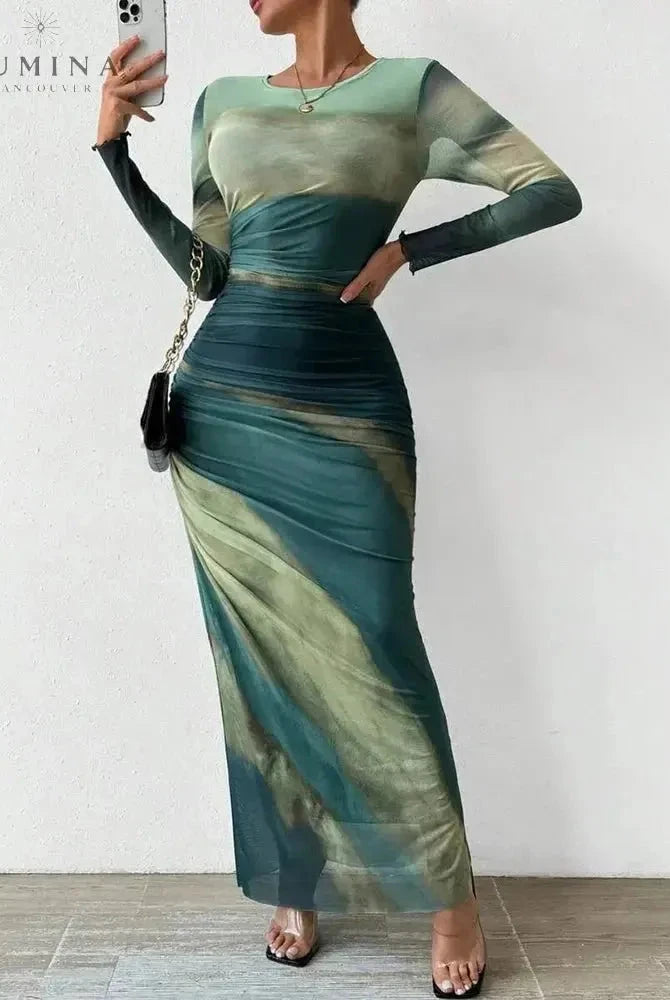 Dark blue Inara Dream Maxi Dress by Lumina Wear, elegant wedding guest dress featuring a flowing design and sleeveless style.
