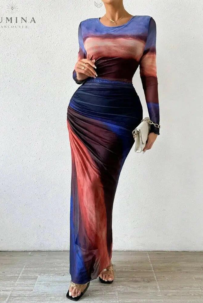 Dark blue Inara Dream Maxi Dress by Lumina Wear, elegant wedding guest dress with flowing fabric and stylish design.