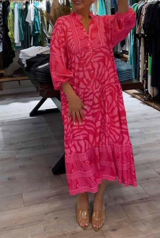 Blue Irene™ vibrant printed dress by Lumina Vancouver showcasing a stylish design, perfect for casual or dressy occasions.