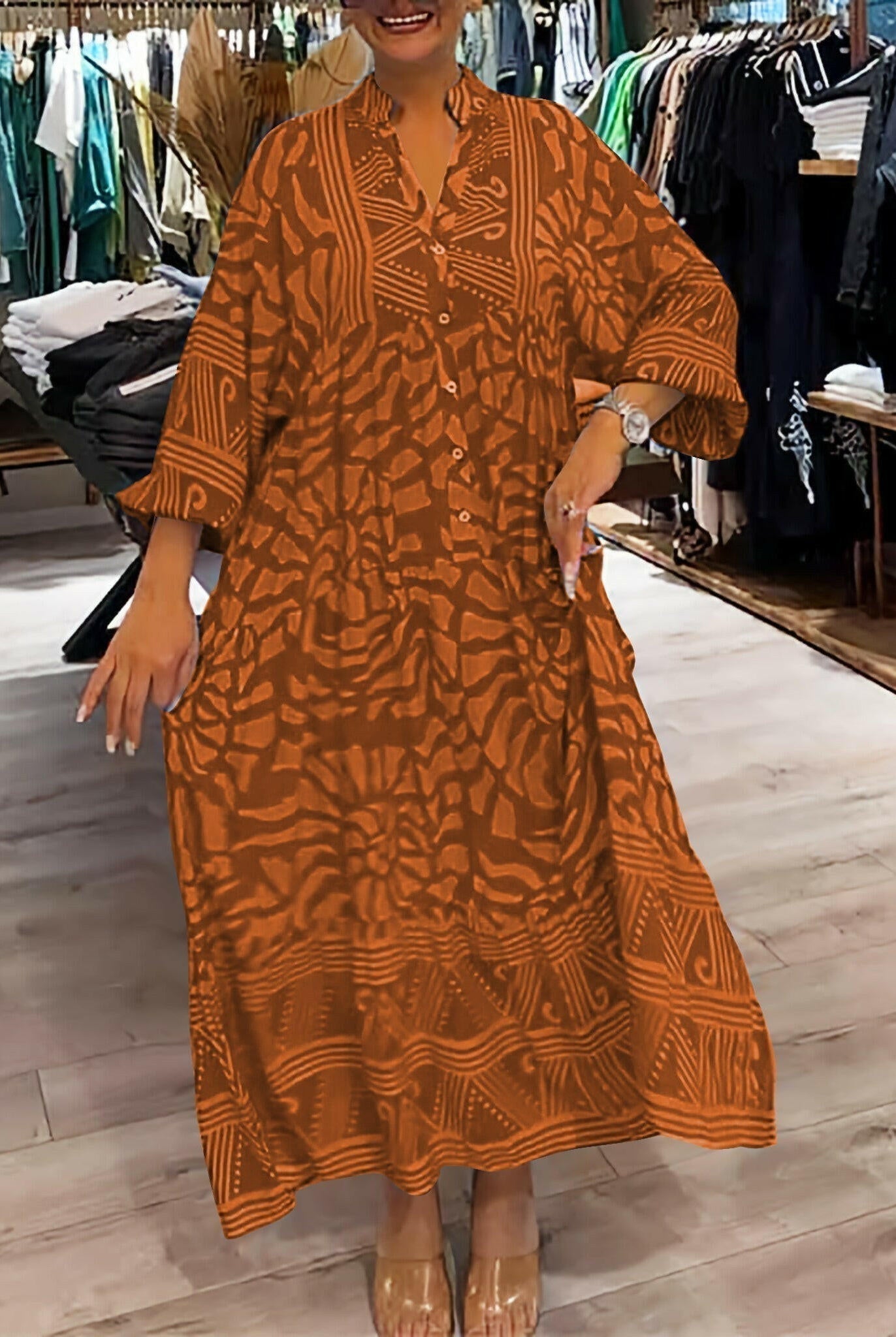 Blue Irene™ Vibrant Printed Dress by Lumina Vancouver, showcasing bold floral patterns and flowing fabric.