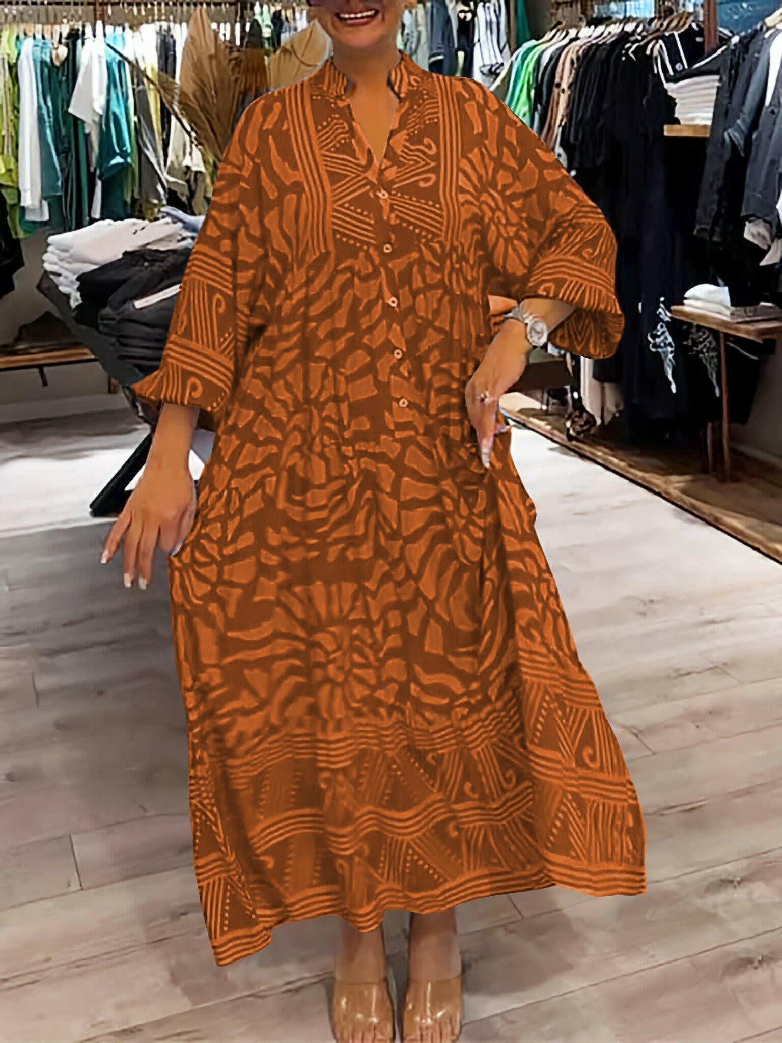 Blue Irene™ Vibrant Printed Dress by Lumina Vancouver, showcasing bold floral patterns and flowing fabric.