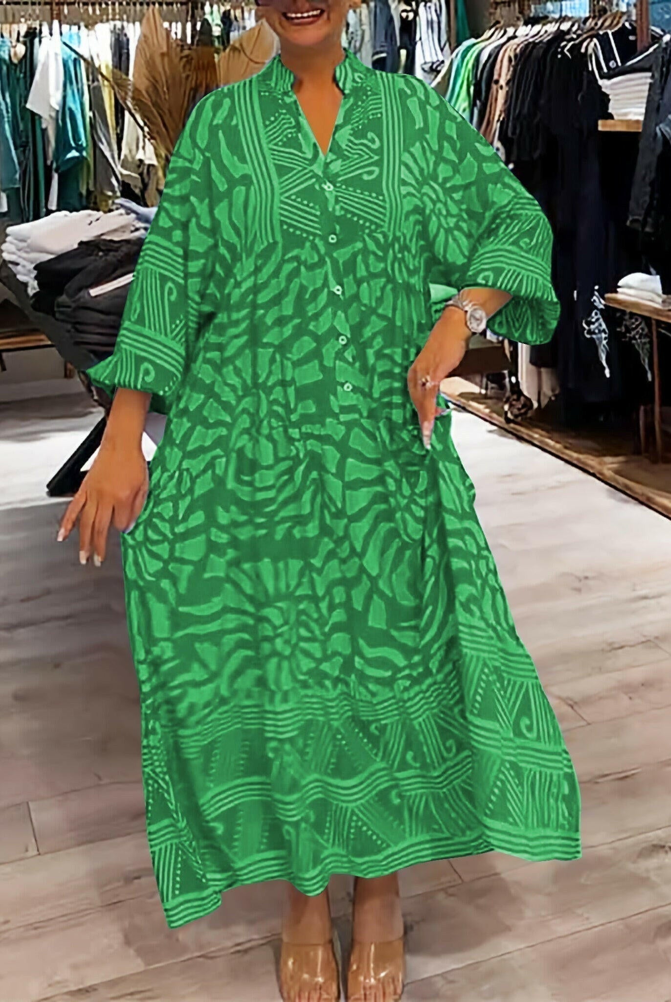 Bright blue Irene™ Vibrant Printed Dress by Lumina Vancouver featuring bold floral patterns, perfect for summer occasions.