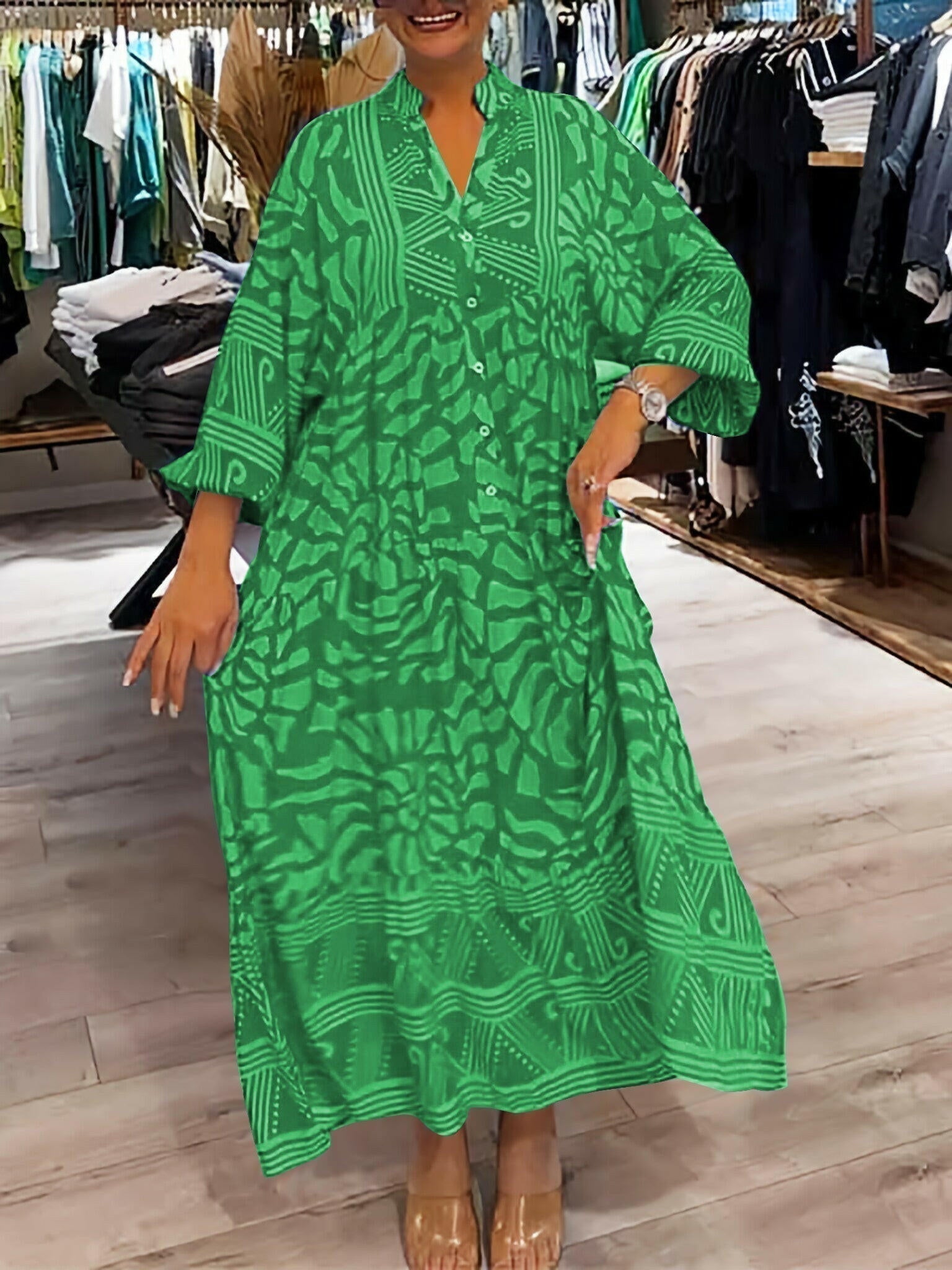 Bright blue Irene™ Vibrant Printed Dress by Lumina Vancouver featuring bold floral patterns, perfect for summer occasions.