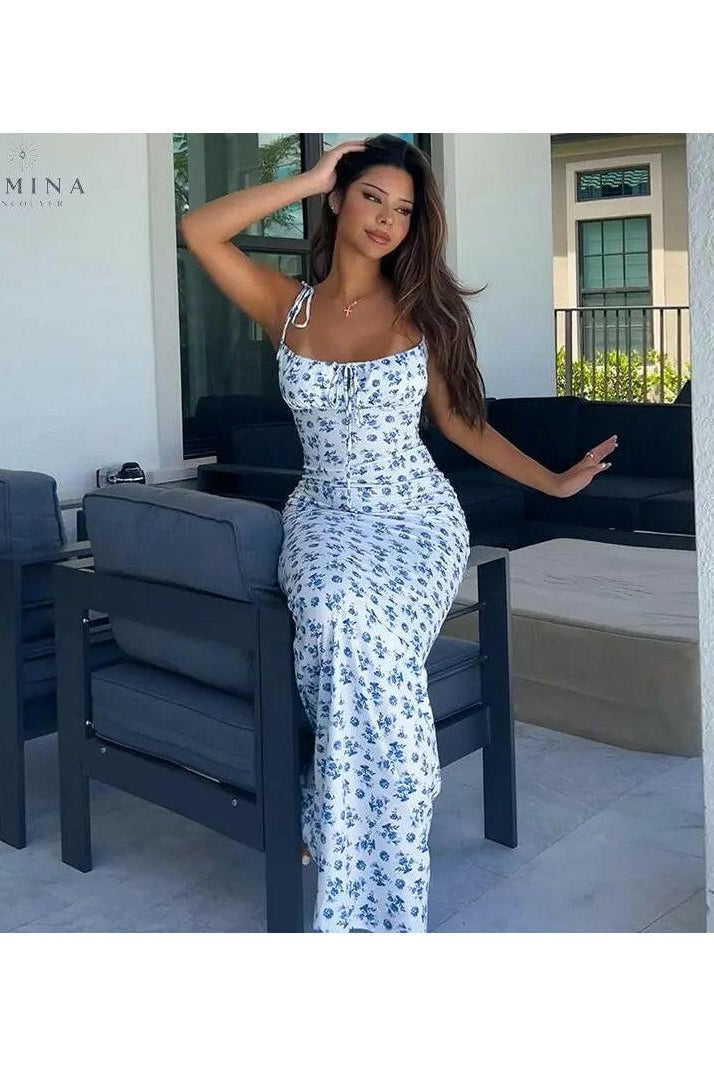 Isabeau Lumina Wear maxi dress in size 8-10 with holiday-inspired design, flowing fabric and elegant style.