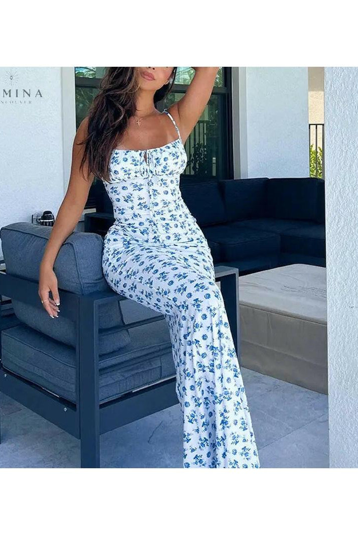 Isabeau Lumina Wear maxi dress in size S-8/10 featuring holiday-inspired design, flowing fabric, and vibrant colors.