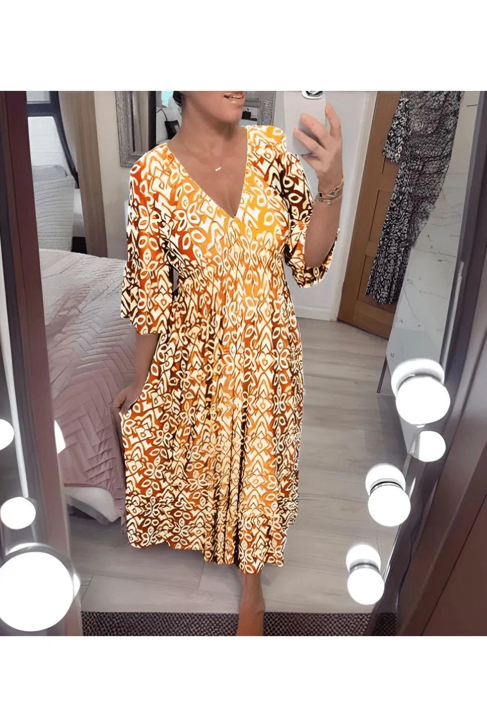 Red boho printed dress by Lumina Wear, featuring flowy fabric and vibrant patterns, perfect for casual or summer wear.