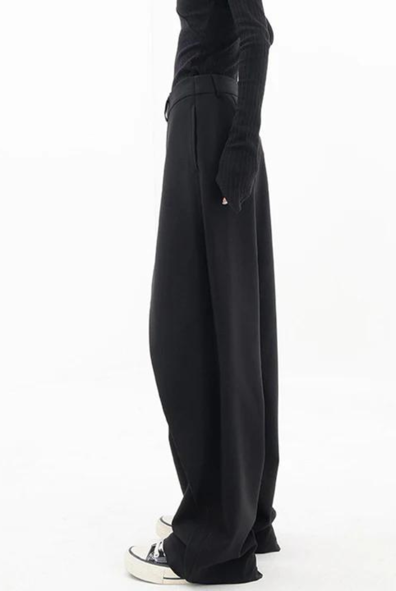 Black Isabella Lumina Wear chic asymmetric wide-leg trousers with a stylish, flowing fit and modern design.