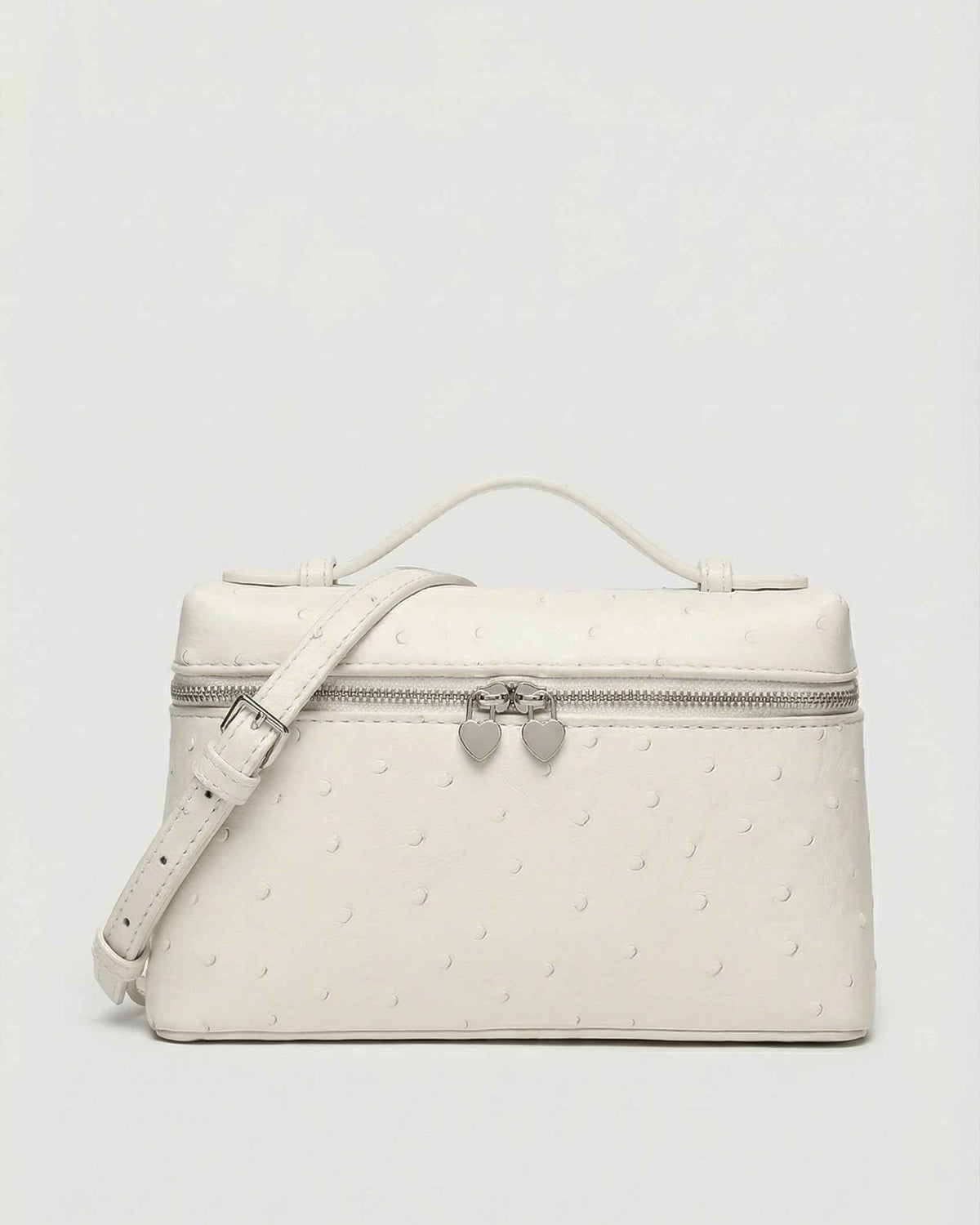 Lumina Wear Isabella black crossbody handbag with adjustable strap, stylish and compact for everyday use.