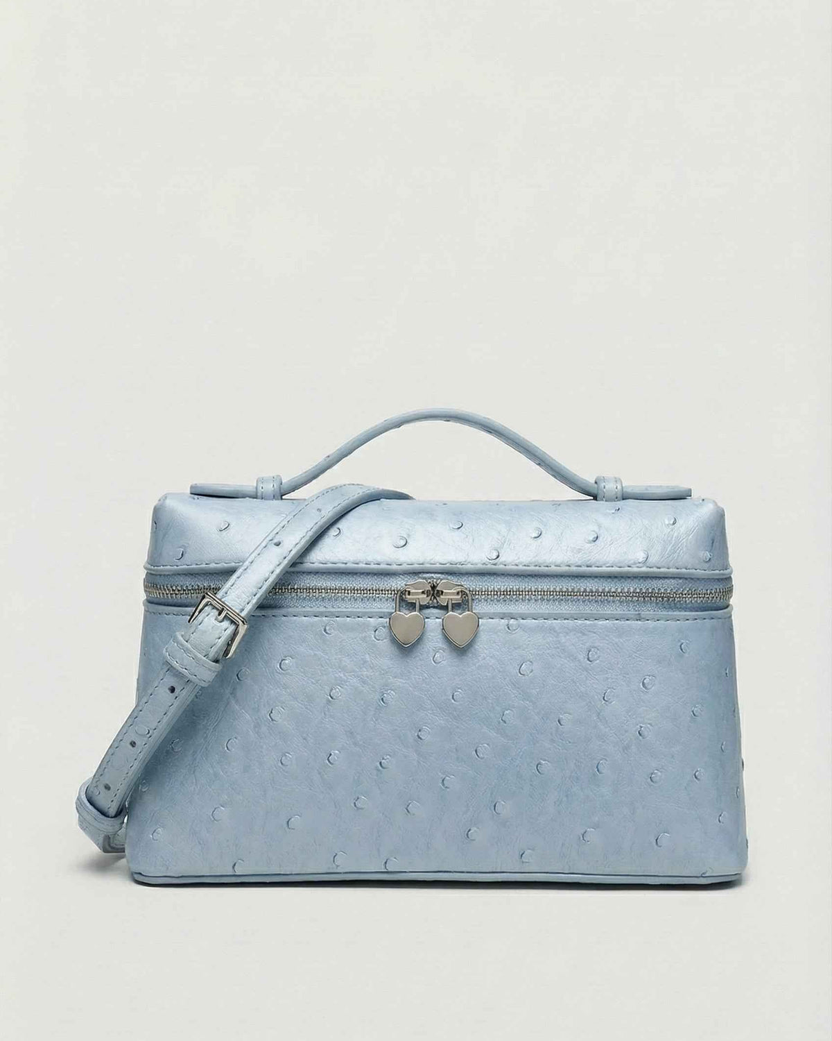 Lumina Wear Isabella black crossbody handbag with adjustable strap, stylish and compact for everyday use.