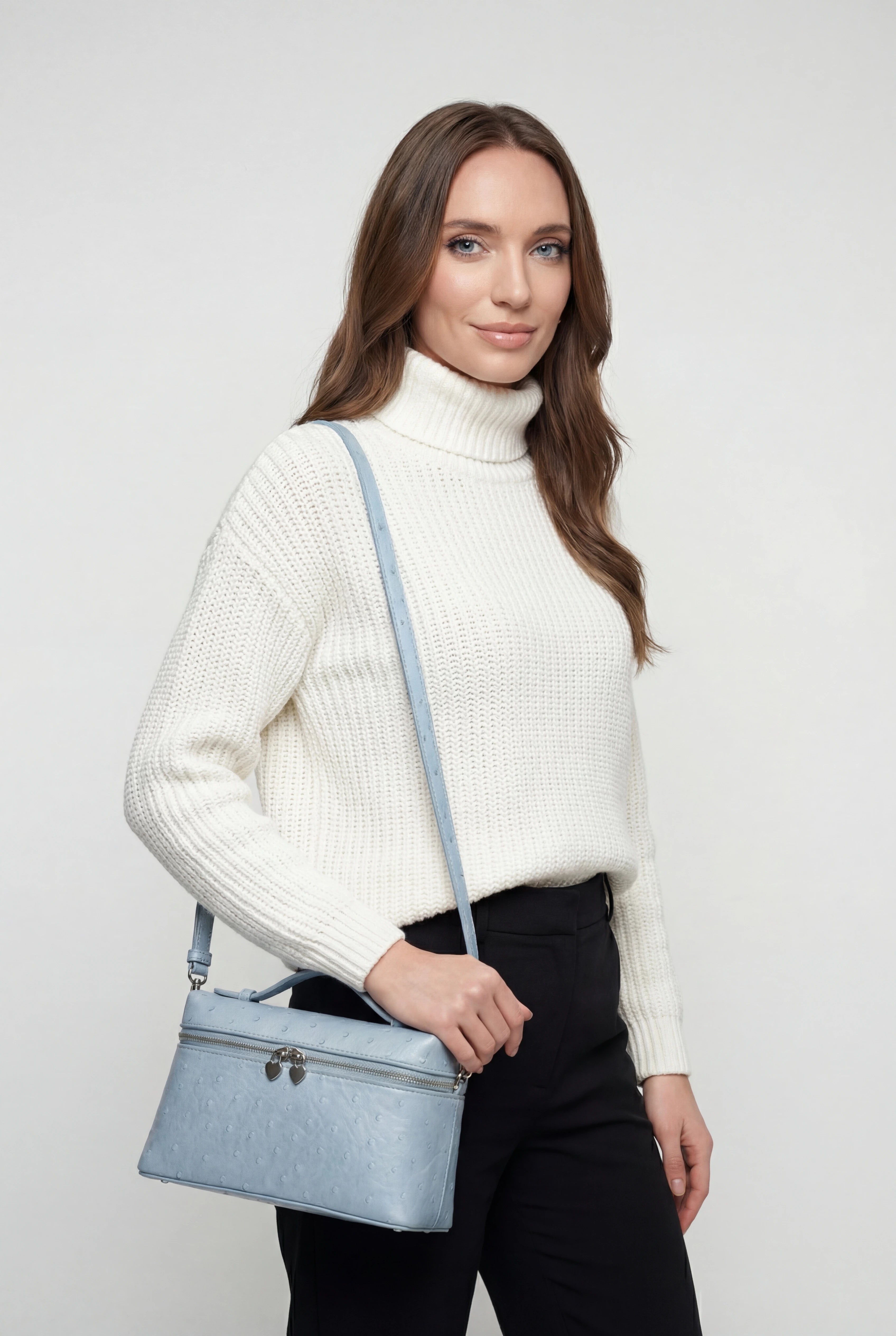 Lumina Wear Isabella chic black crossbody bag with adjustable strap, stylish handbag for everyday use.