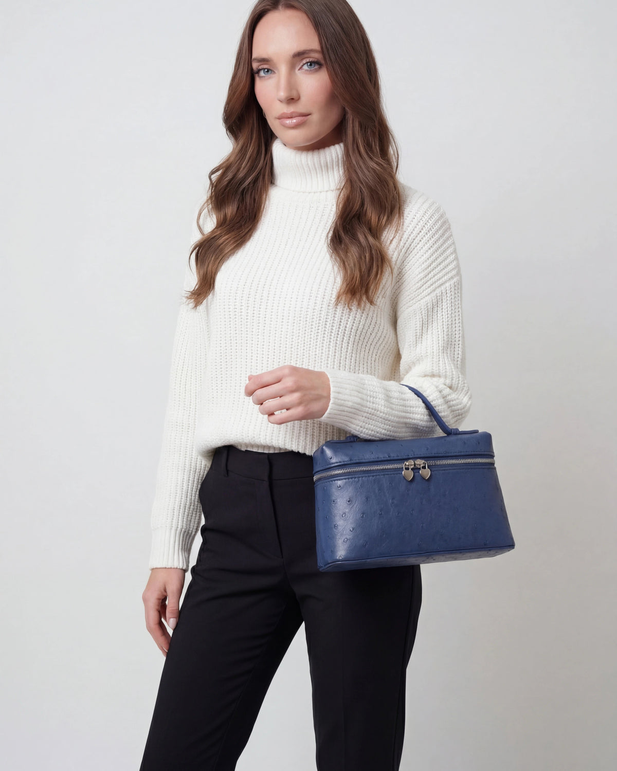 Lumina Wear Isabella black crossbody handbag with adjustable strap, stylish and compact for everyday use.