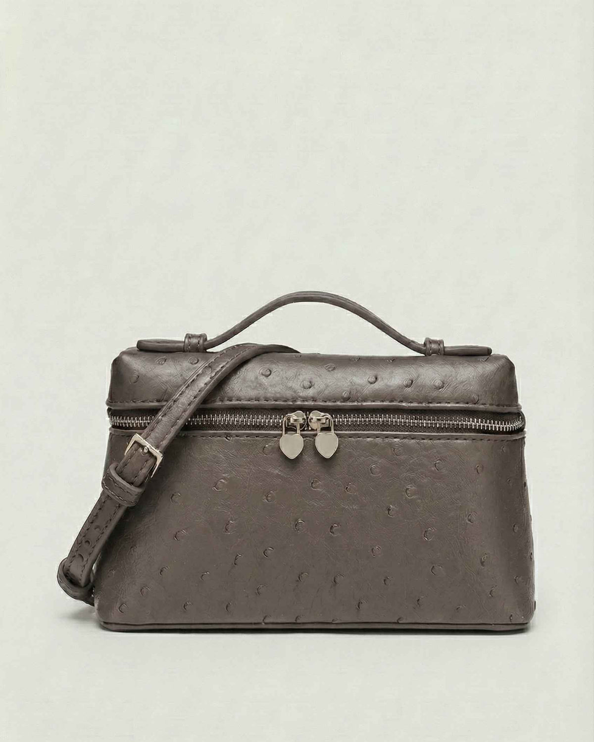 Lumina Wear Isabella black crossbody handbag with adjustable strap, stylish and compact for everyday use.
