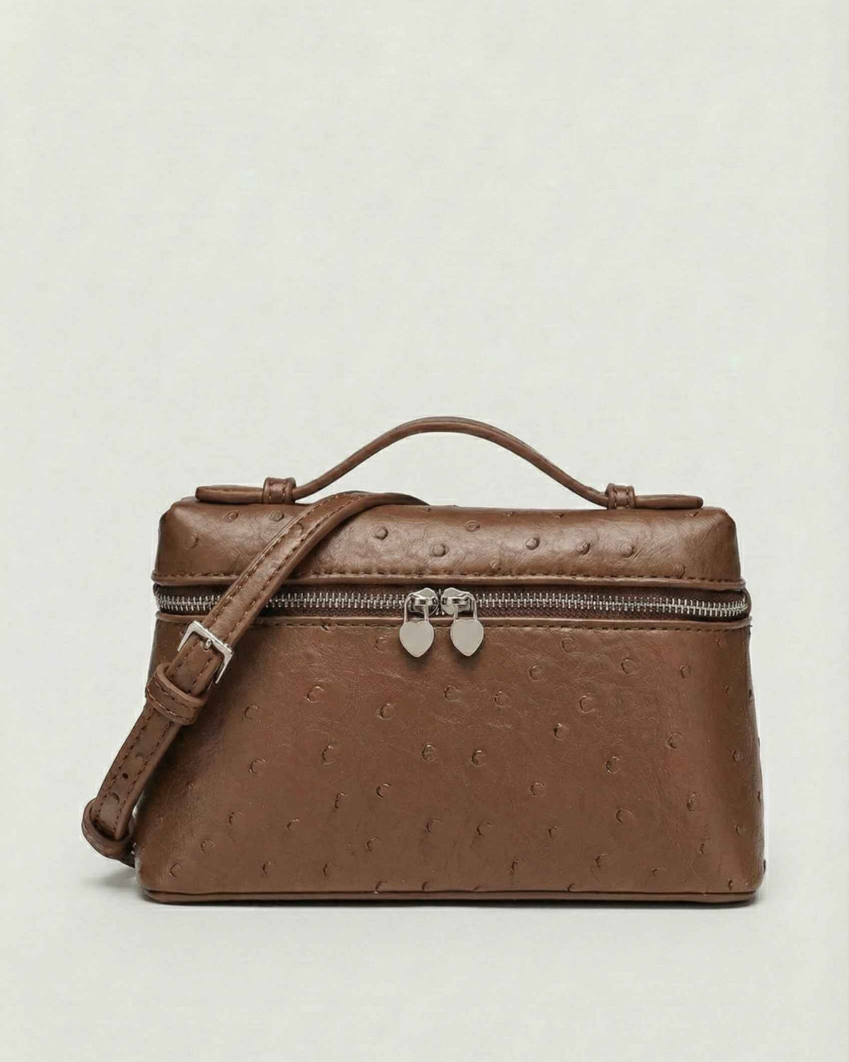 Lumina Wear Isabella black crossbody handbag with adjustable strap, stylish and compact for everyday use.