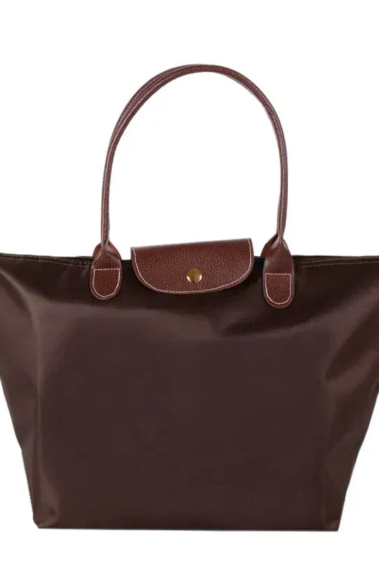 Lumina Wear Isabella chic black faux leather handbag with spacious interior and stylish design, perfect for everyday use.