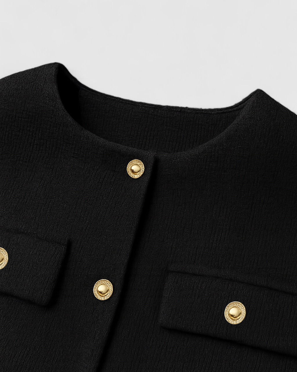Black short jacket from Lumina Wear's Isabella collection, featuring a chic, versatile style for women.