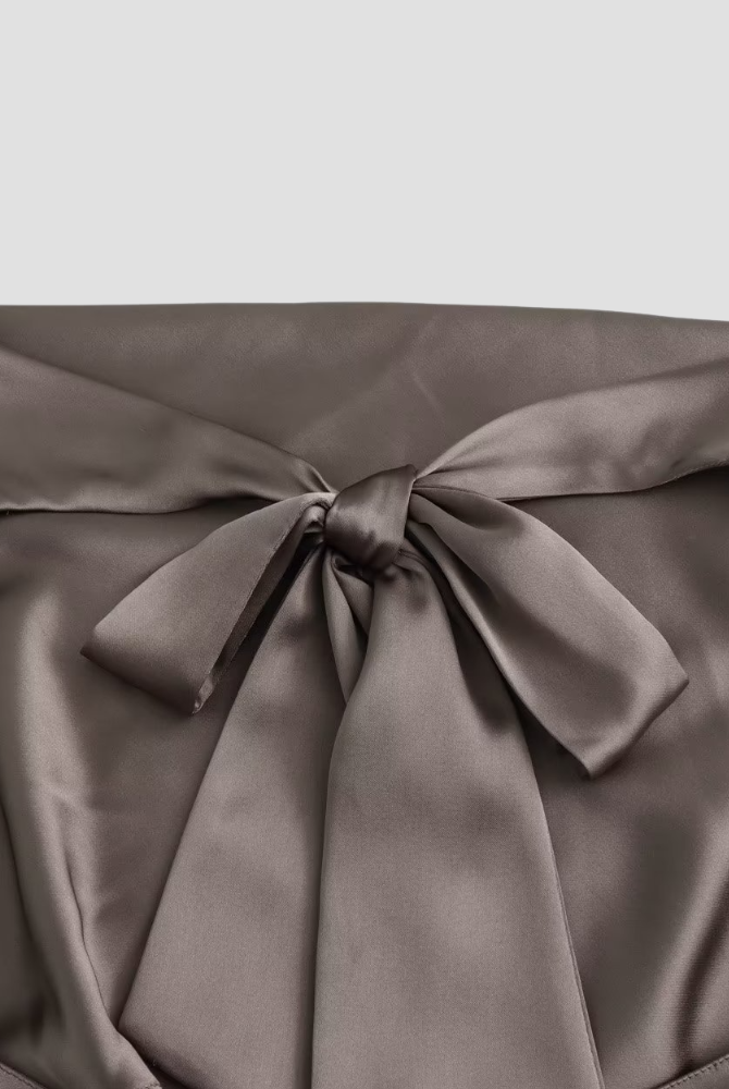 Brown Isabella Lumina Wear satin tank top with draped design and halter tie, perfect for chic casual wear.