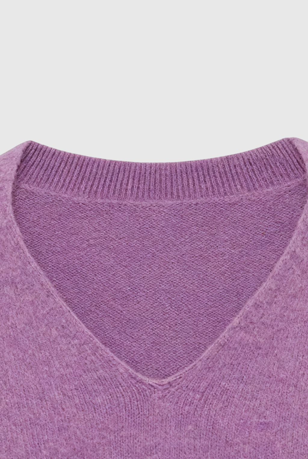 Dark purple Lumina Wear Isabella cozy sweater with a flattering fit, displayed on a plain background.