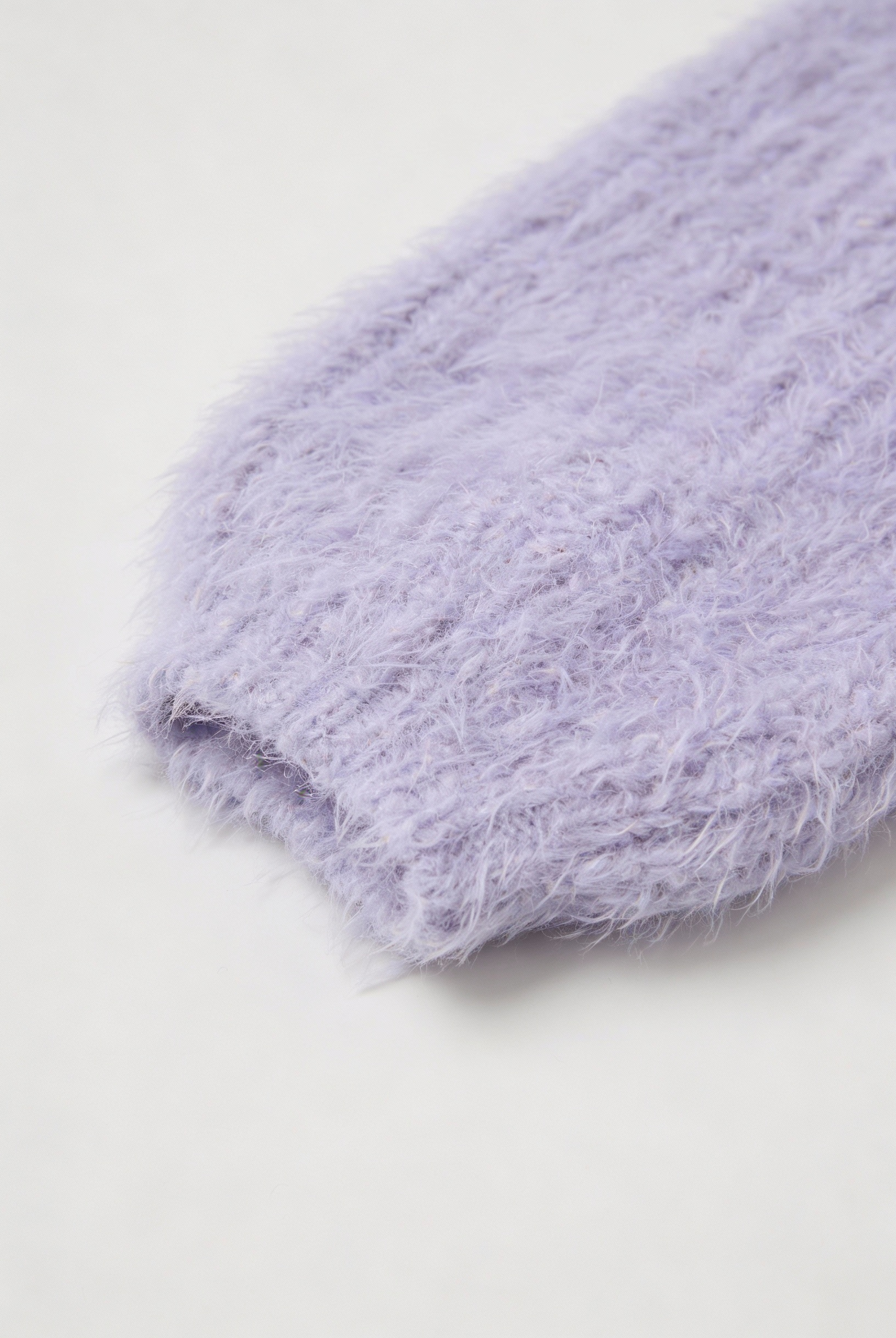 Isabella Lumina cozy purple knit cardigan with ribbed details, featuring long sleeves and a relaxed fit, perfect for casual wear.