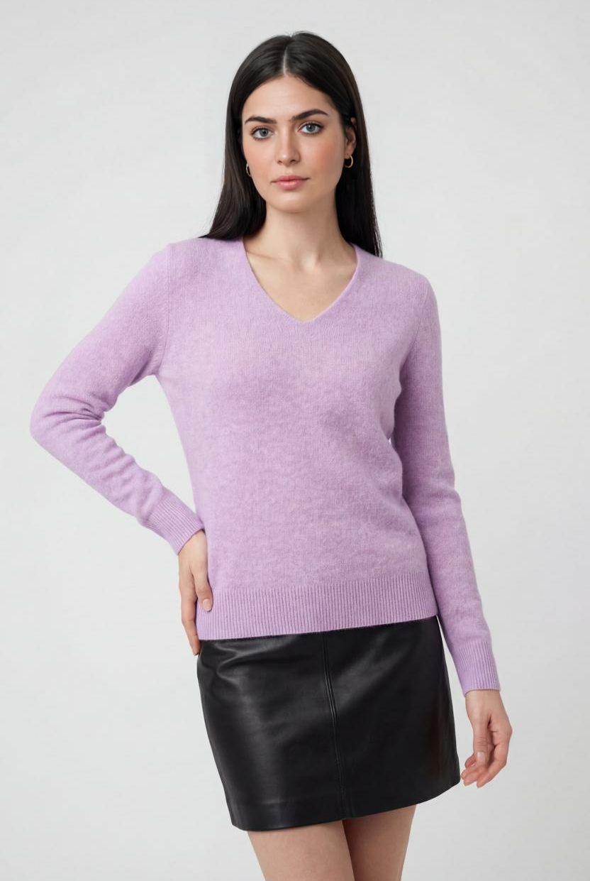 Lumina Wear Isabella purple knit sweater with V-neckline, showcasing a cozy and stylish design in a soft, vibrant purple color.